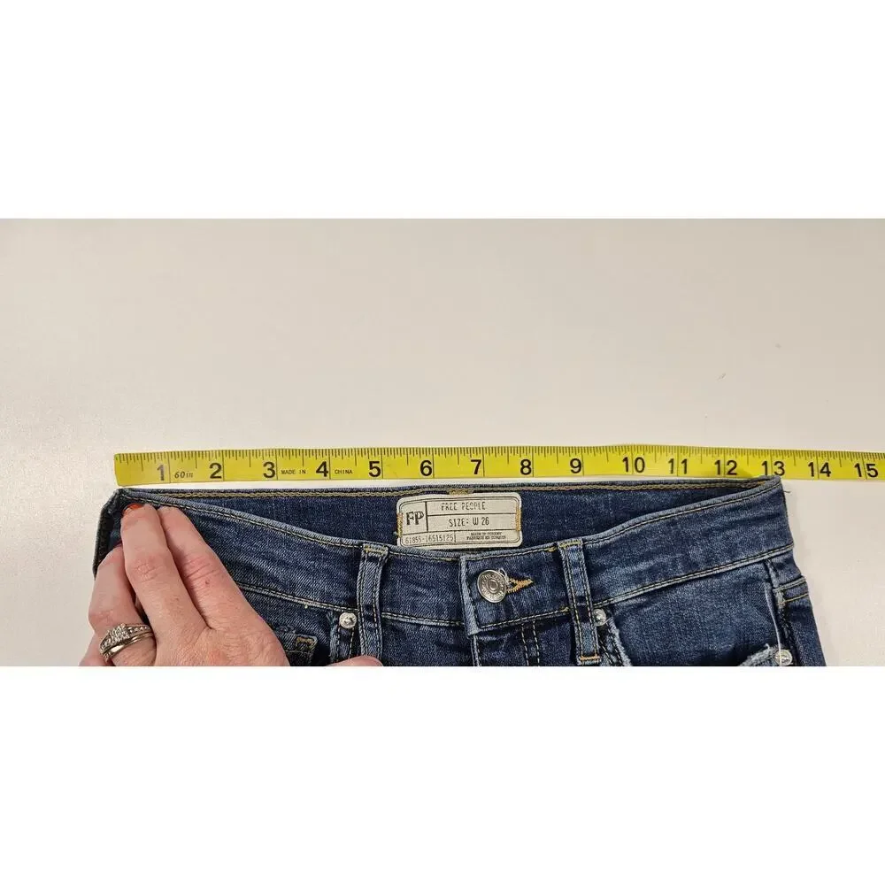 NWT free people midnight blue destroyed mid rise blue jeans 26